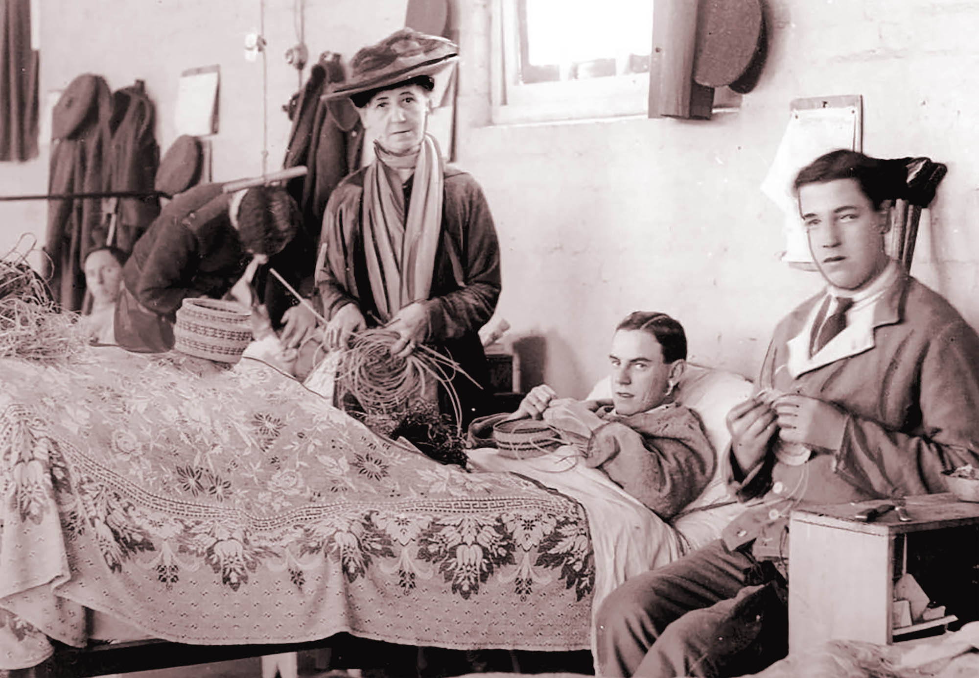 An archive photo of soldiers in a hospital doing handicraft therapy